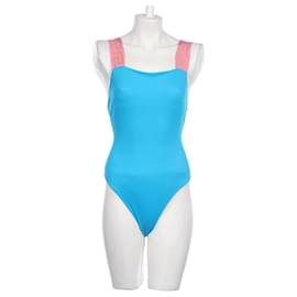 Bañador de una pieza azul Versace con tirantes rosas Greca