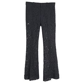 Pantalones acampanados de encaje Gucci en algodón negro