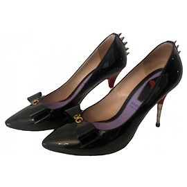 Gucci Pumps aus schwarzem Lackleder