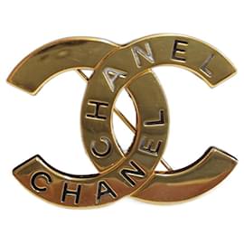 Spilla Chanel CC metallo dorato