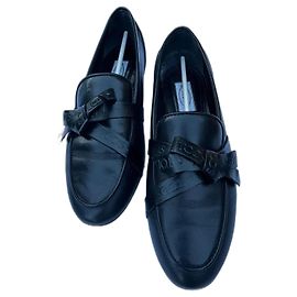 Tod's Mokassins aus schwarzem Leder mit Schleife