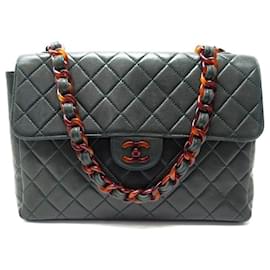 BORSA A MANO VINTAGE CHANEL CLASSICA JUMBO CON CATENA VERDE AMBRA - Chanel