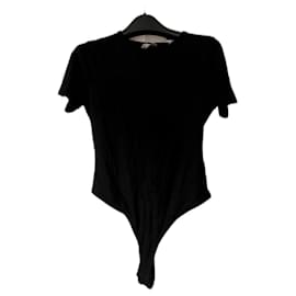 Conjunto de 2 bodys Asos blanco y negro manga corta Talla 36
