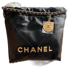 Borsa a mano Chanel 22 Mini in pelle di vitello nera