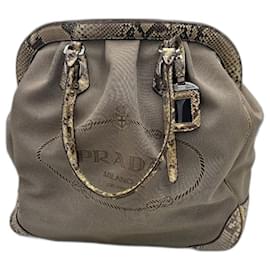 Prada Handtasche aus beige Canvas und Python