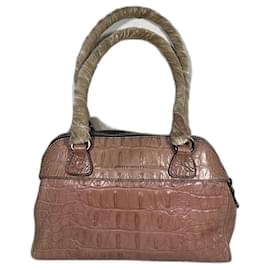 borsa Miu Miu in coccodrillo goffrato con chiusura a cerniera