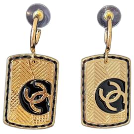 Orecchini Chanel dorati in metallo