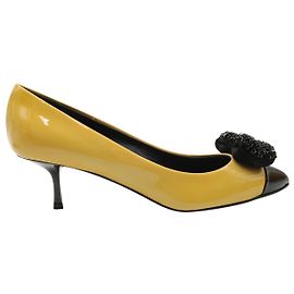 Décolleté con fiocco decorato Giuseppe Zanotti in pelle verniciata gialla