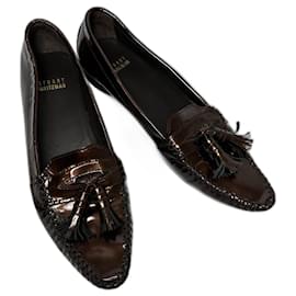 Mocassini con nappe Stuart Weitzman in pelle verniciata bronzo