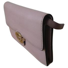 Pochette Gucci in pelle Interlock