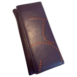 Purificacion Garcia Geldbörse aus Leder dunkelviolett und orange