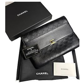 Pochette Chanel Matelassé in pelle nera