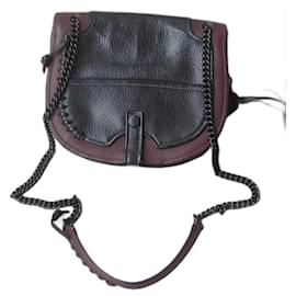 Borsa Coach in pelle martellata nera e bordeaux