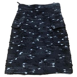 Falda Chanel de tweed negra y blanca lana