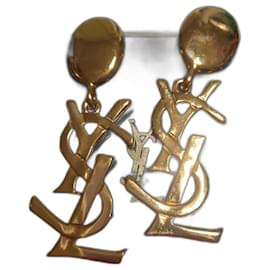 Boucles d'oreilles pendantes Yves Saint Laurent dorées