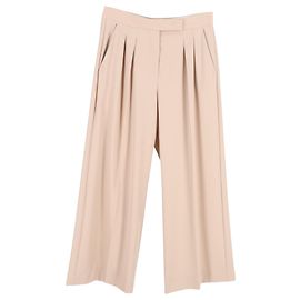 Pantalón ancho plisado Max Mara de lana virgen color melocotón