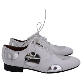 Oxford stringate a pois Marni in pelle bianca e argento
