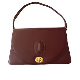 Cartier Handtasche aus dunkelrotem Leder