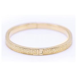 Autre Marque Bracciale rigido in oro stile greco.