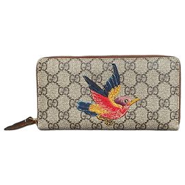 Portafoglio lungo con zip Gucci GG Supreme beige