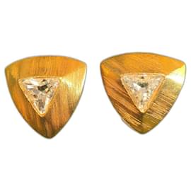 Boucles d'oreilles Yves Saint Laurent dorées à clips avec cristal