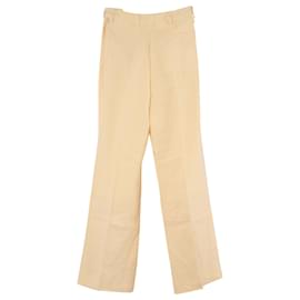 Pantalones con cierre lateral de lino amarillo de Acne Studios