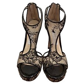 Jimmy Choo Sandalen aus Spitze und Leder mit Absatz
