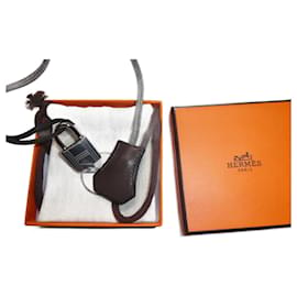 clochette , tirette et cadenas  hermès neuf pour sac hermès  boite dustbag - Hermès