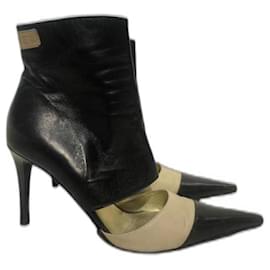 Botines Chanel de piel negro y beige