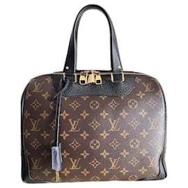 Borsa Louis Vuitton modello Retiro in monogram e pelle nera