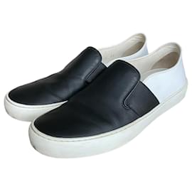 Sneakers slip on Chanel in pelle nera e bianca
