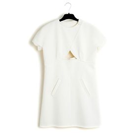 Vestido Courreges FR42 en lana color crema con corte en A y recortes, talla US12.