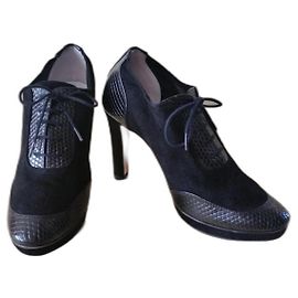 Botines Repetto de cuero negro y ante