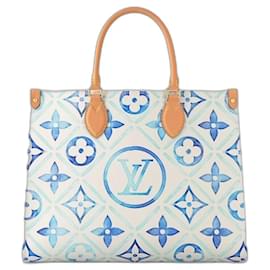 Louis Vuitton LV Onthego MM vicino alla piscina