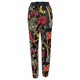 Pantaloni Versace in velluto barocco floreale