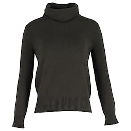 Jersey con cuello alto y espalda abierta de Nina Ricci en lana gris