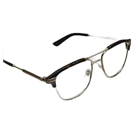 Occhiali da sole Gucci GG0241O 003 Dorati Metallo