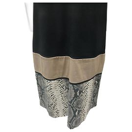 Autre Marque Schwarzes Kleid aus Manga-Larga