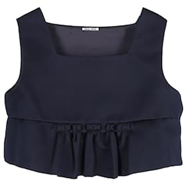 Top corto con peplum Duchesse de seda azul marino de Miu Miu