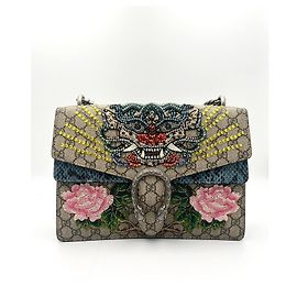 Borsa Gucci Dionysus in cristallo e pelle di serpente