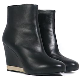 CHANEL - Botines de cuña de cuero negro (Tamaño 39)