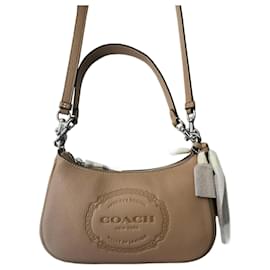 Borsa Coach in pelle taupe con finiture argentate
