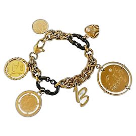 Raro brazalete vintage DOLCE & GABBANA "Token Money" dorado