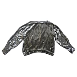 Blusa Dior de seda con lentejuelas y perlas plateadas