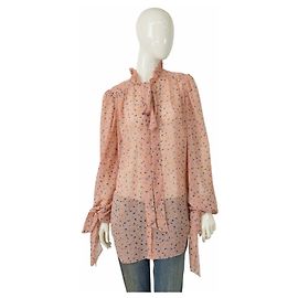 Autre Marque Camicia Poustovit rosa floreale trasparente con grandi fiocchi