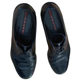 Mocassins Prada en cuir noir