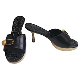 Mules Chanel in pelle nera 37