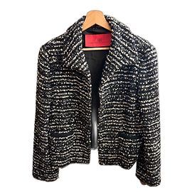 Chaqueta vintage de lana virgen bouclé de Carolina Herrera.
