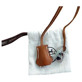 clochette , tirette et cadenas  hermès neuf pour sac hermès   dustbag