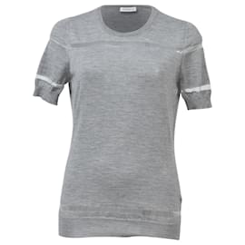 Top de lana gris con rayas de malla de Viktor & Rolf